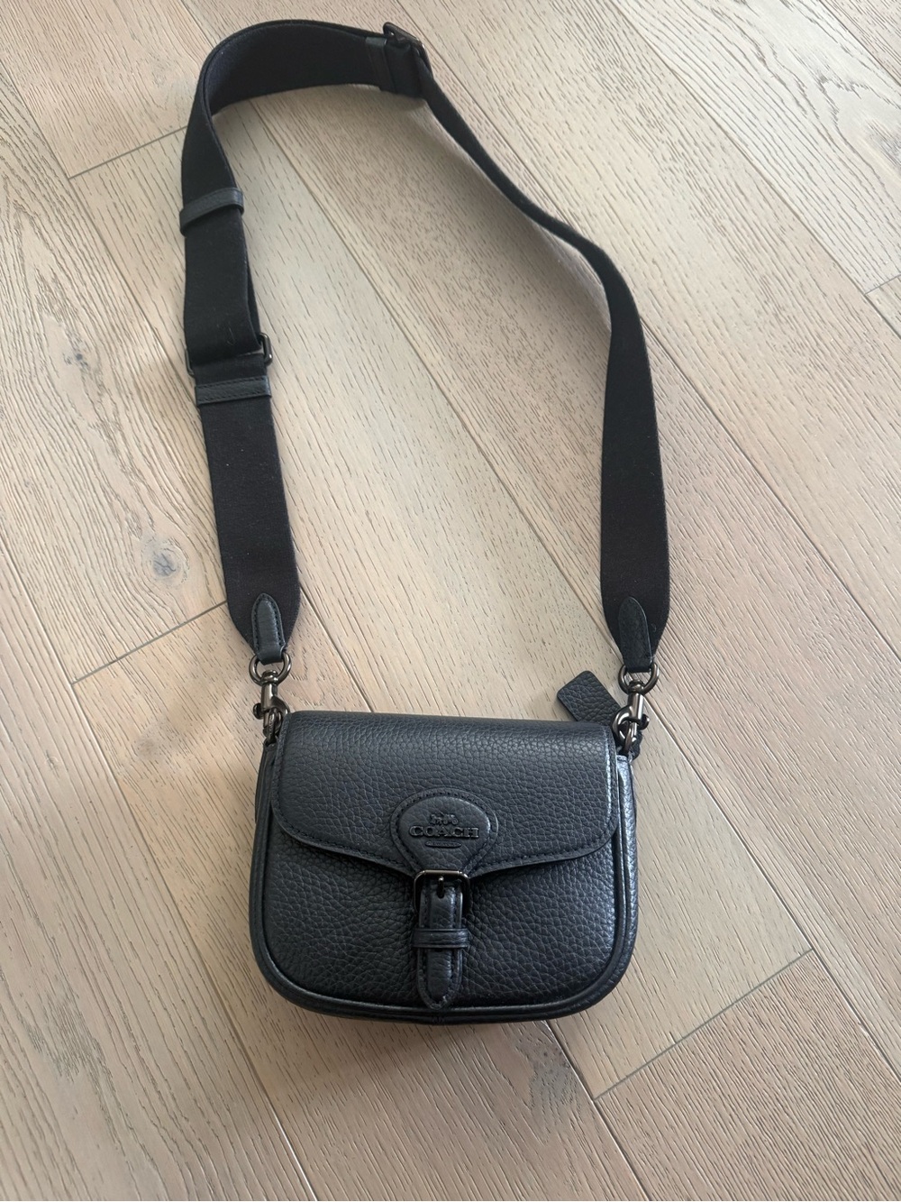 Coach - black leather saddle bag